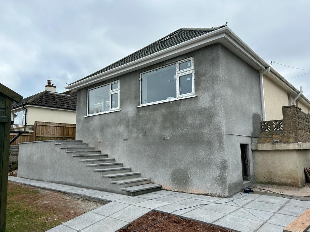 A completed rear house extension and new roof - 